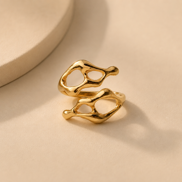JYOCO Energy Flow ring  gold featuring an organic sculptural openwork design, handcrafted artisan jewellery inspired by fluid forms and contemporary sculpture.