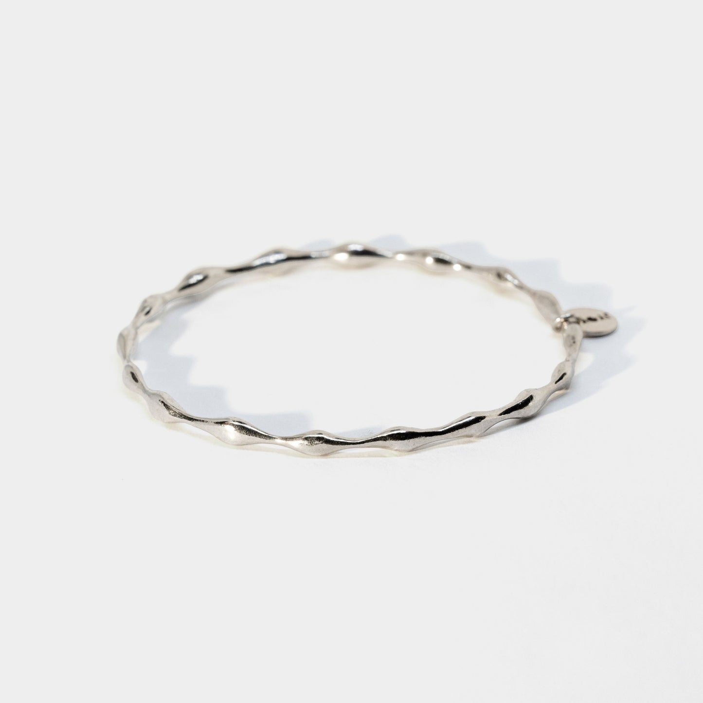 Silver bracelet on a white background